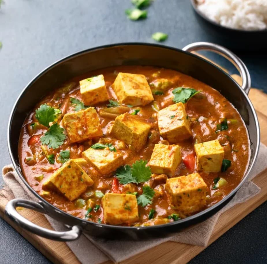 Indian curries, tandoori breads and sweets platter